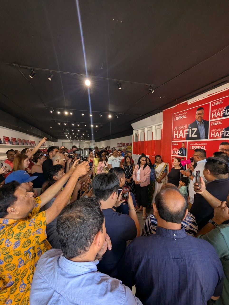 Supporters fill the campaign office at its grand opening